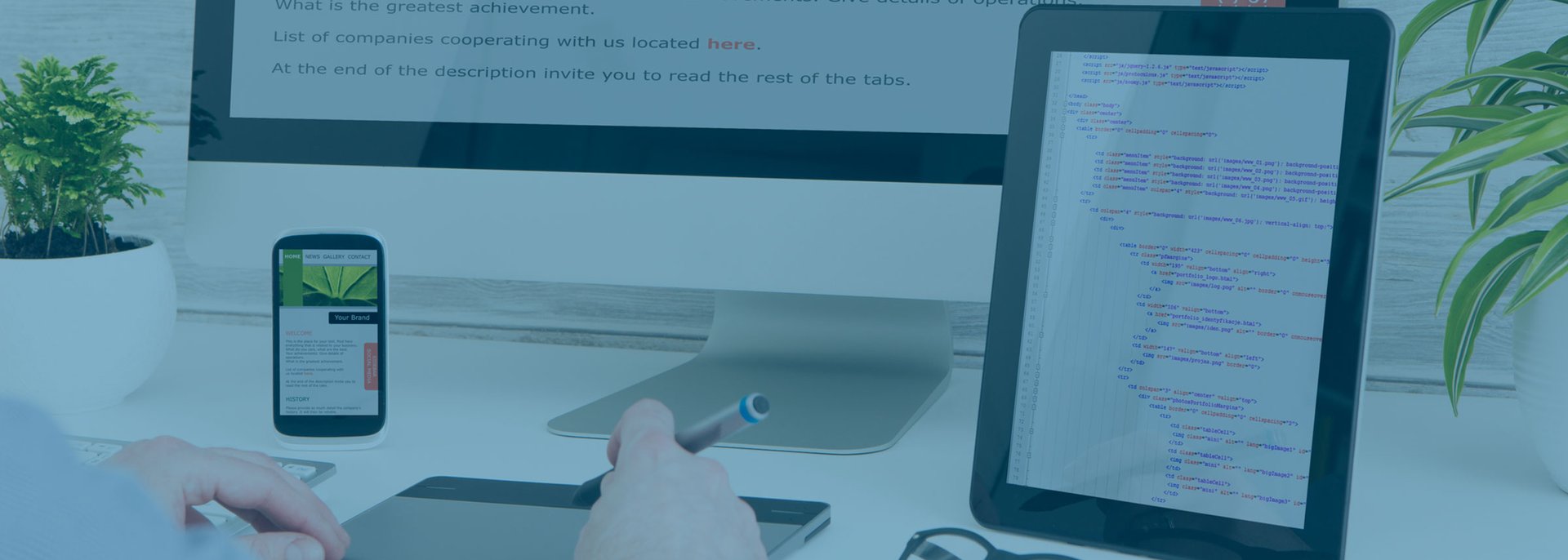Designer's desk with responsive web design concept.