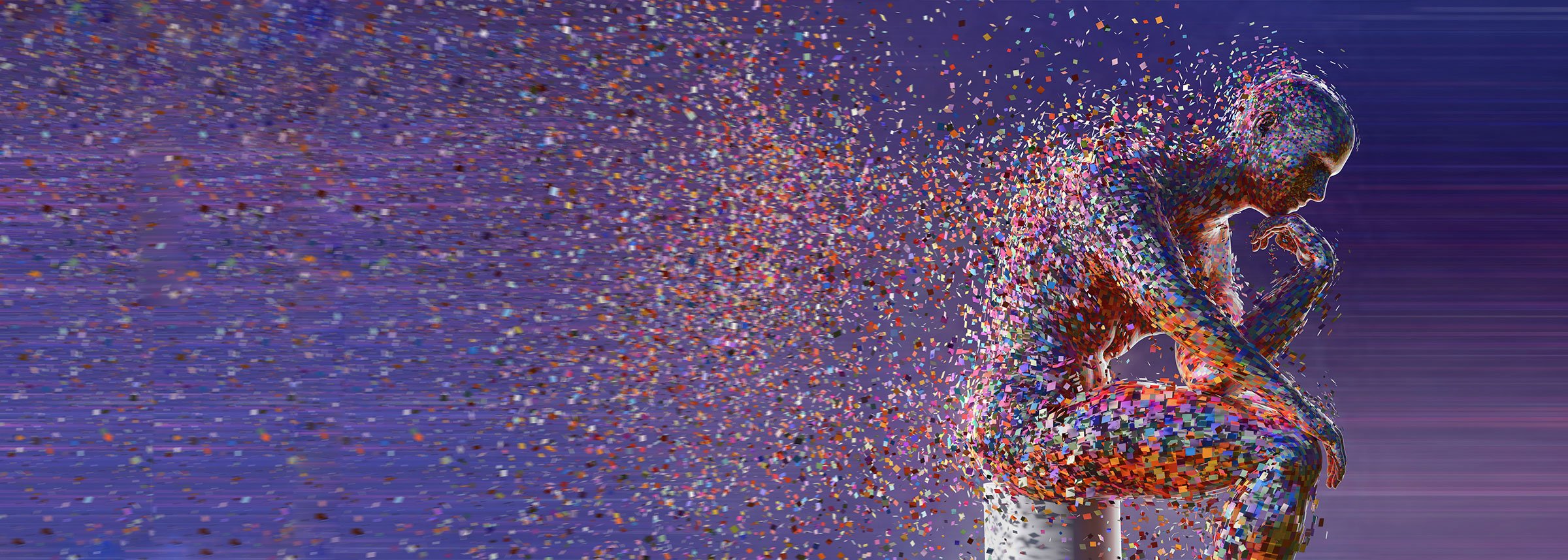 man sitting as particles of his body dissipate.